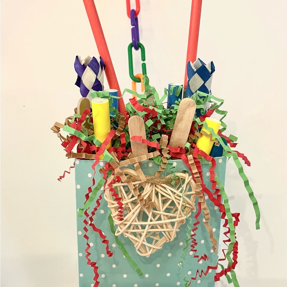 Vibrant Red and Blue Bird Toy with Interactive Features